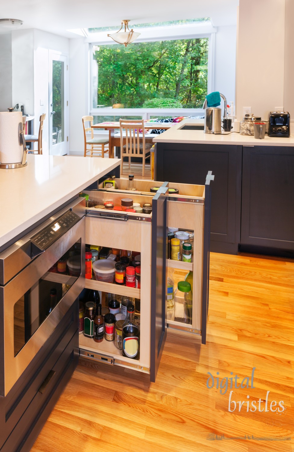 Spice pullouts in kitchen island as part of kitchen remodel