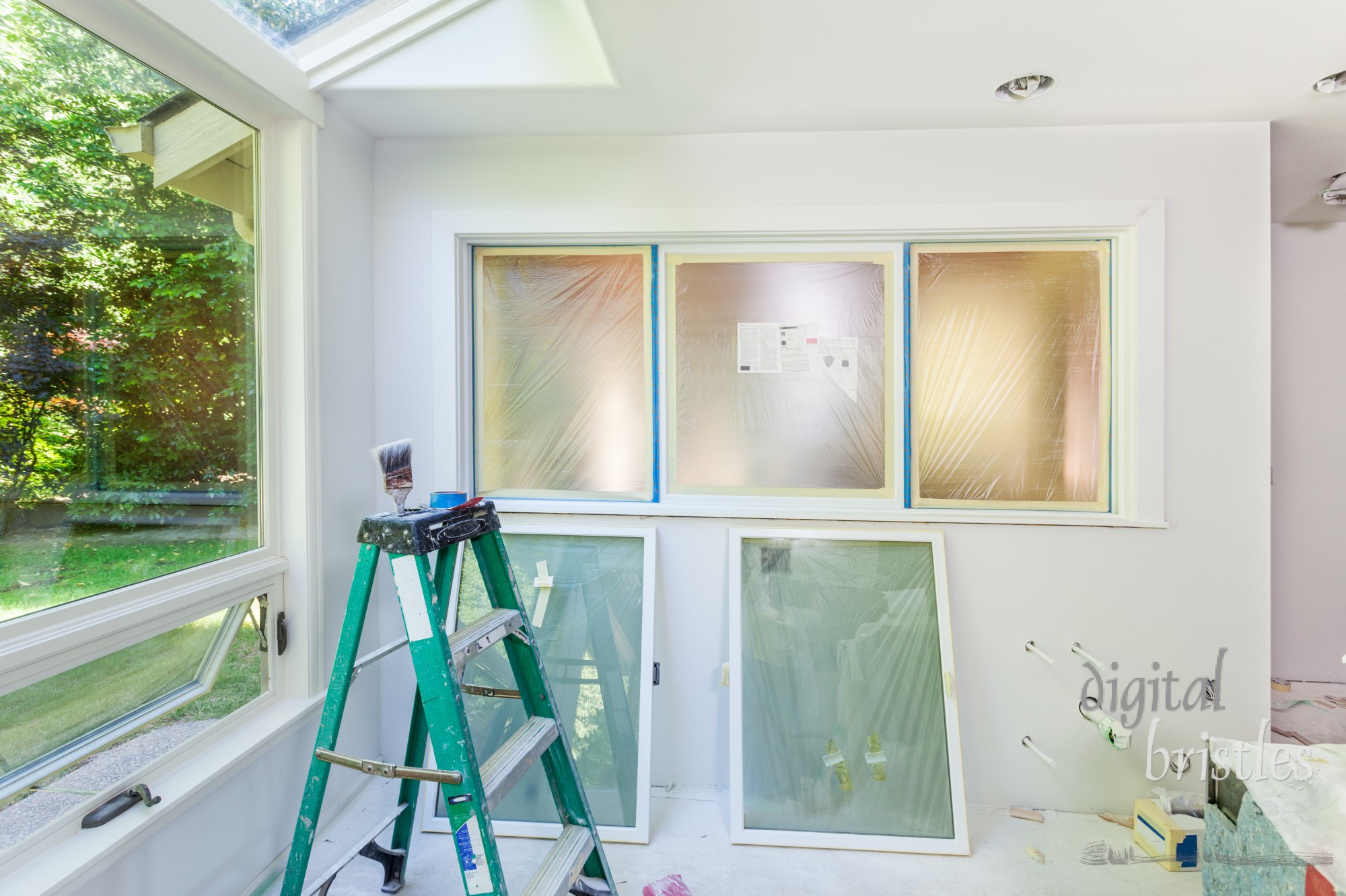 Kitchen window masked for painting