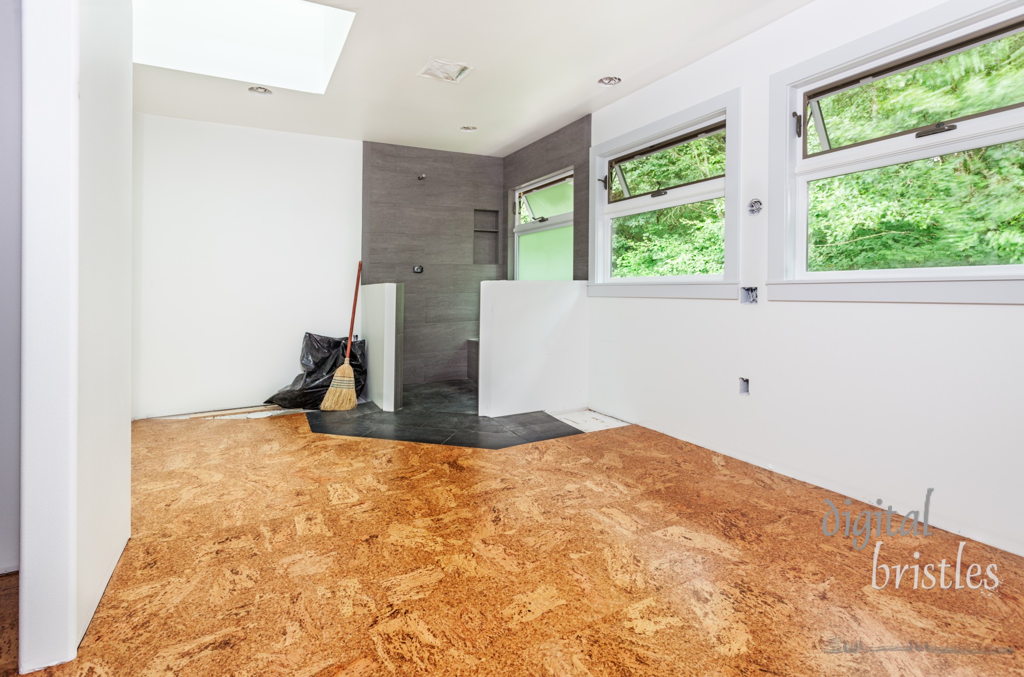 Cork tile floor installed and swept clean