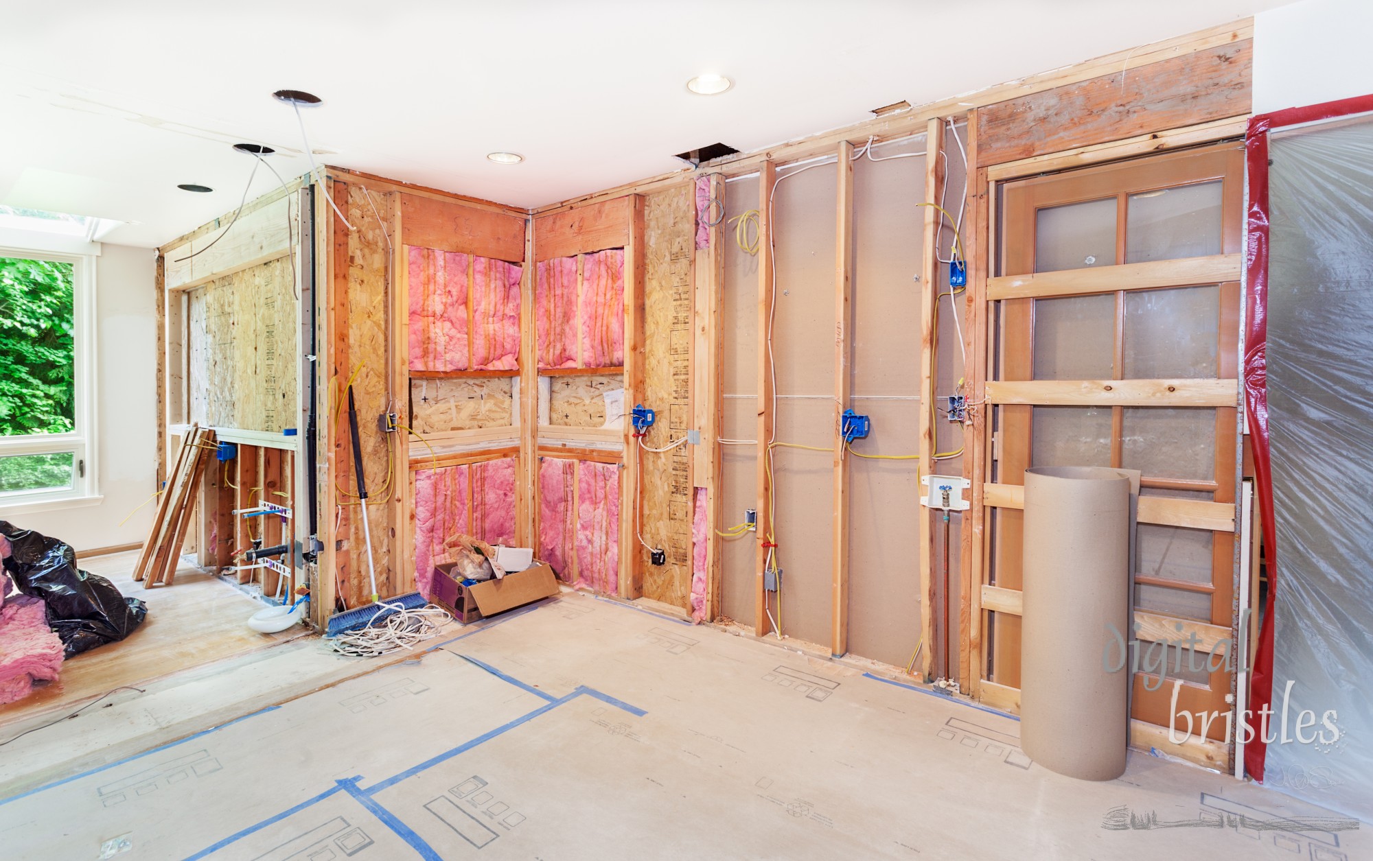 Kitchen remodel gets back to the studs as new windows are framed and new electrical and plumbing are roughed in