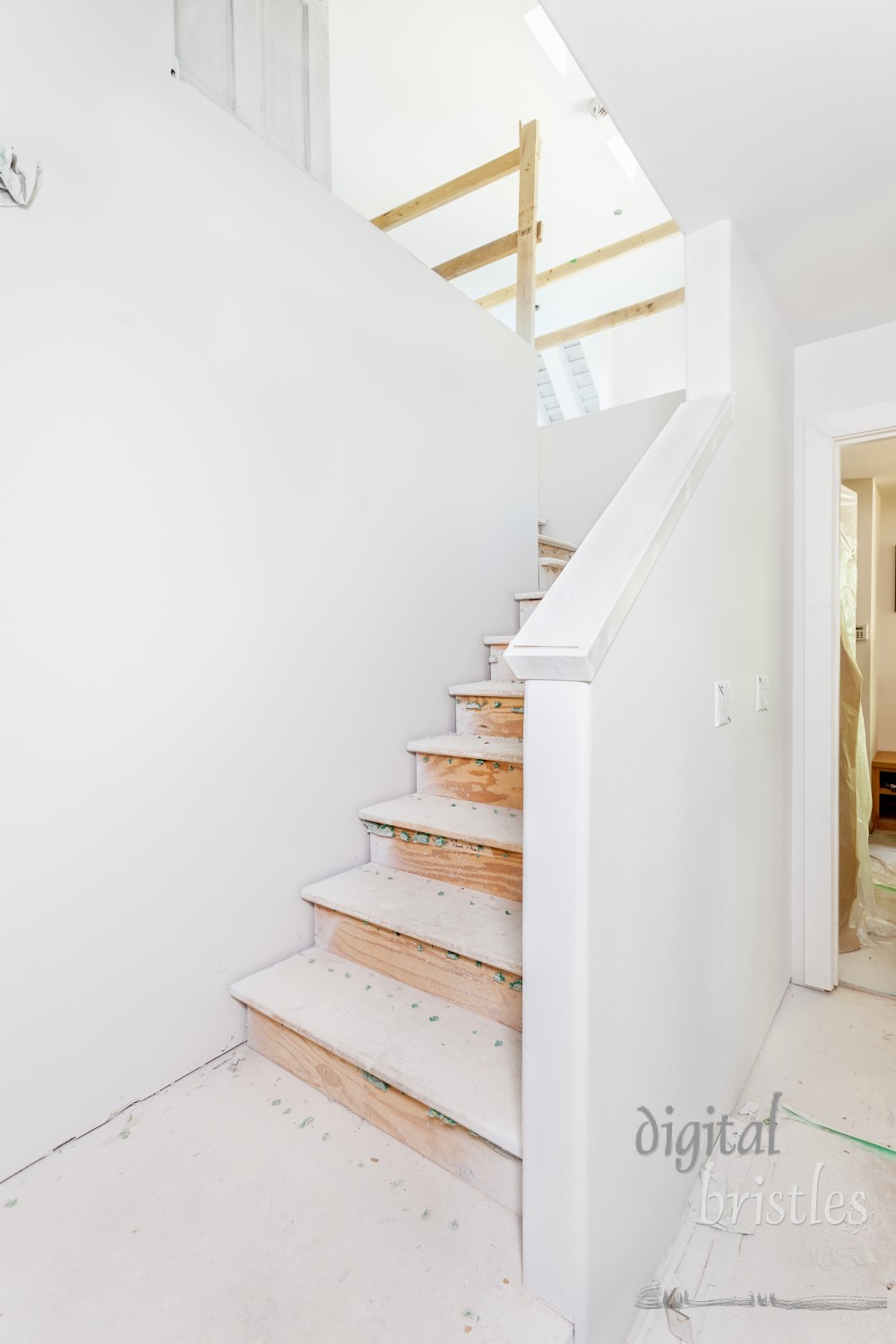 First part of trim work on new staircase - the cap on the lower drywall handrail