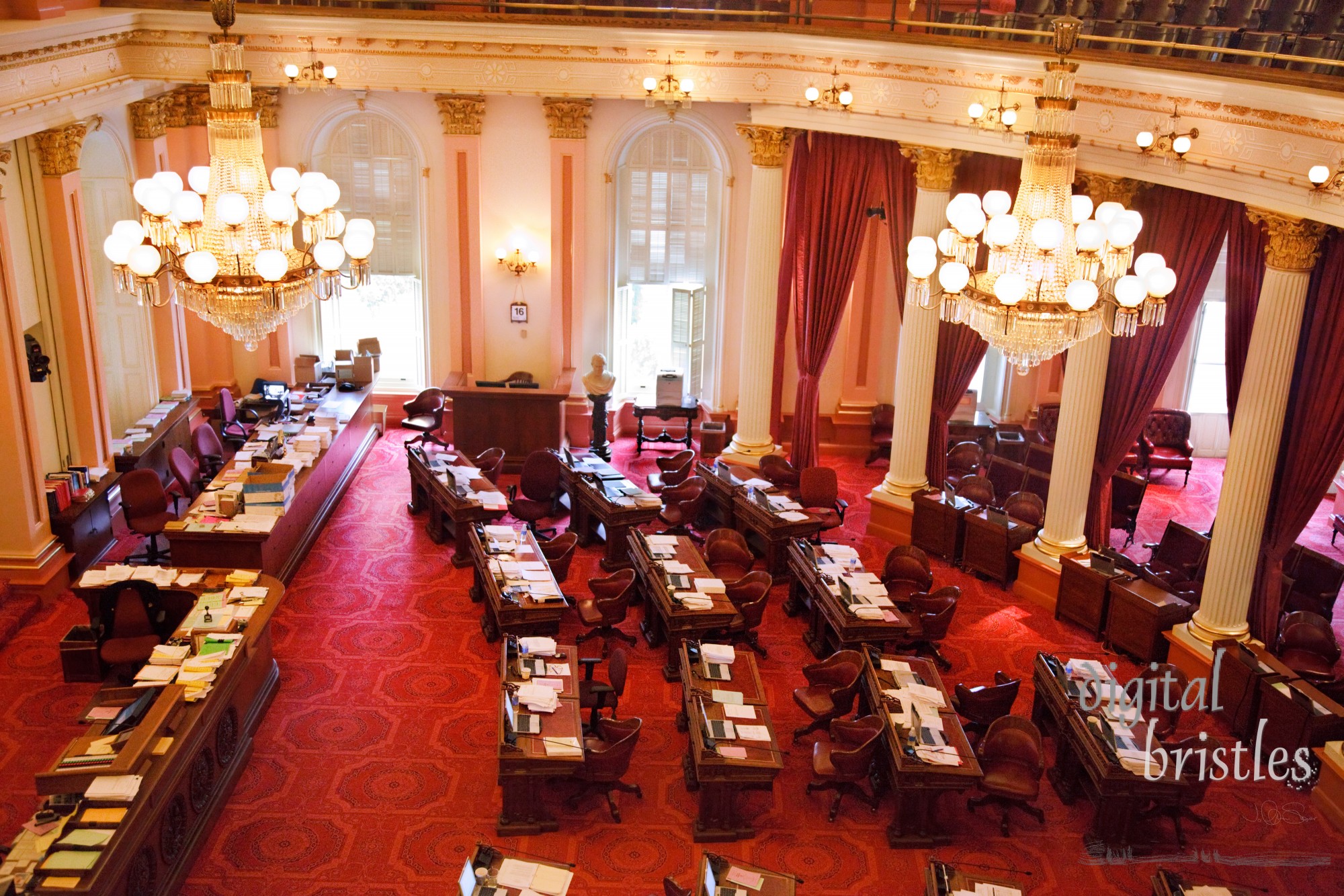 Cluttered desks in the California State Senate chamber