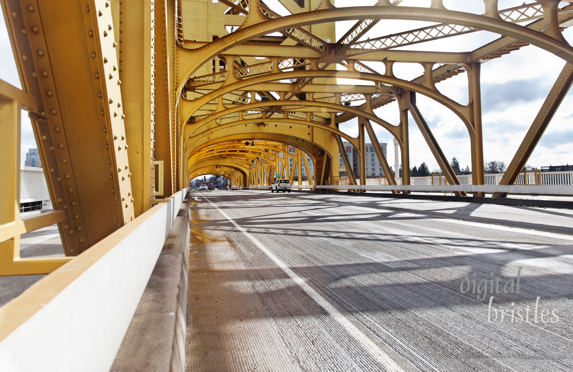 Road through Tower Bridge over the Sacramento River, looking towards the Capitol