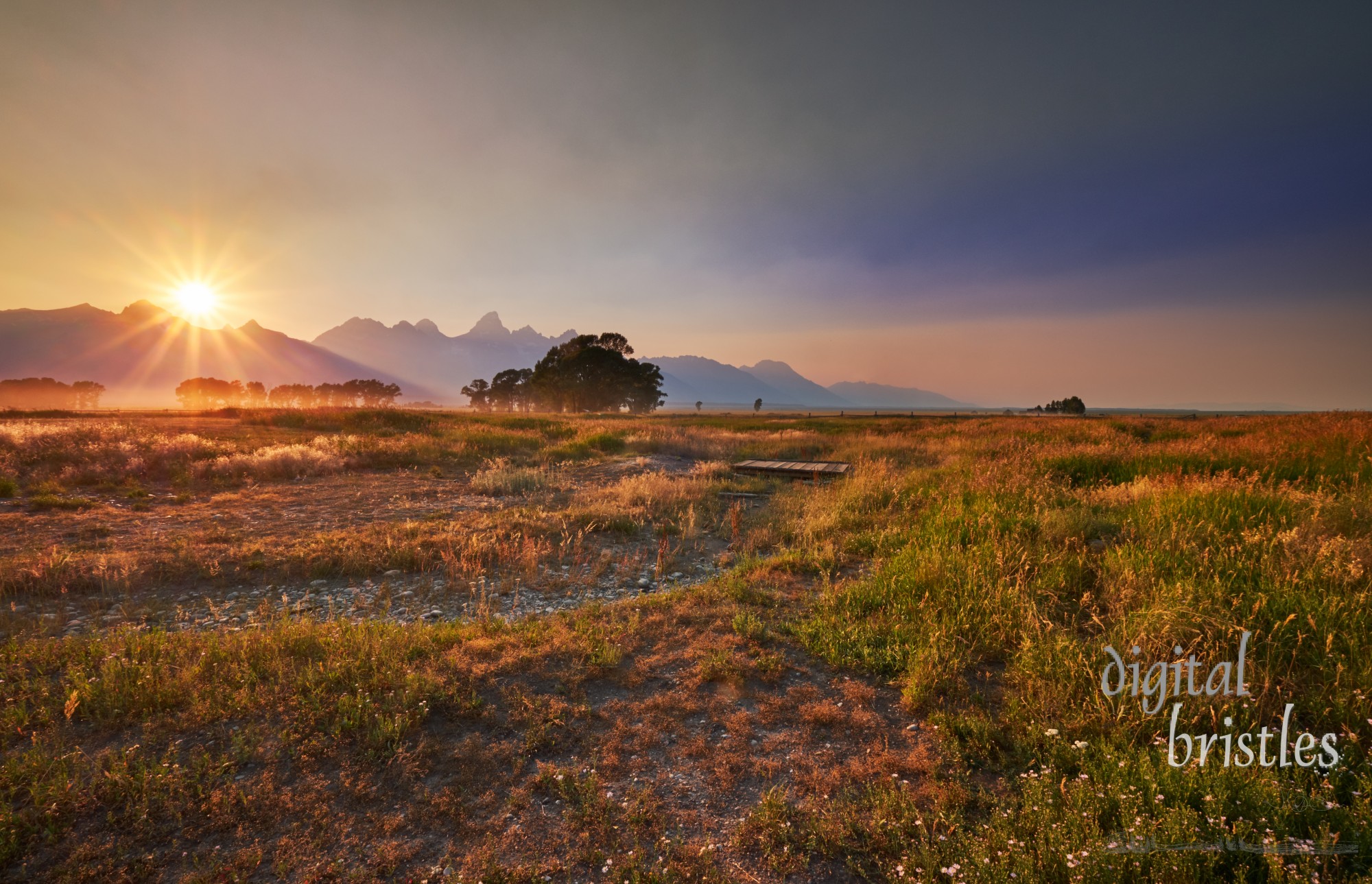 Sunset at Antelope Flats over the untilled fields of abandoned farms at Mormon Row