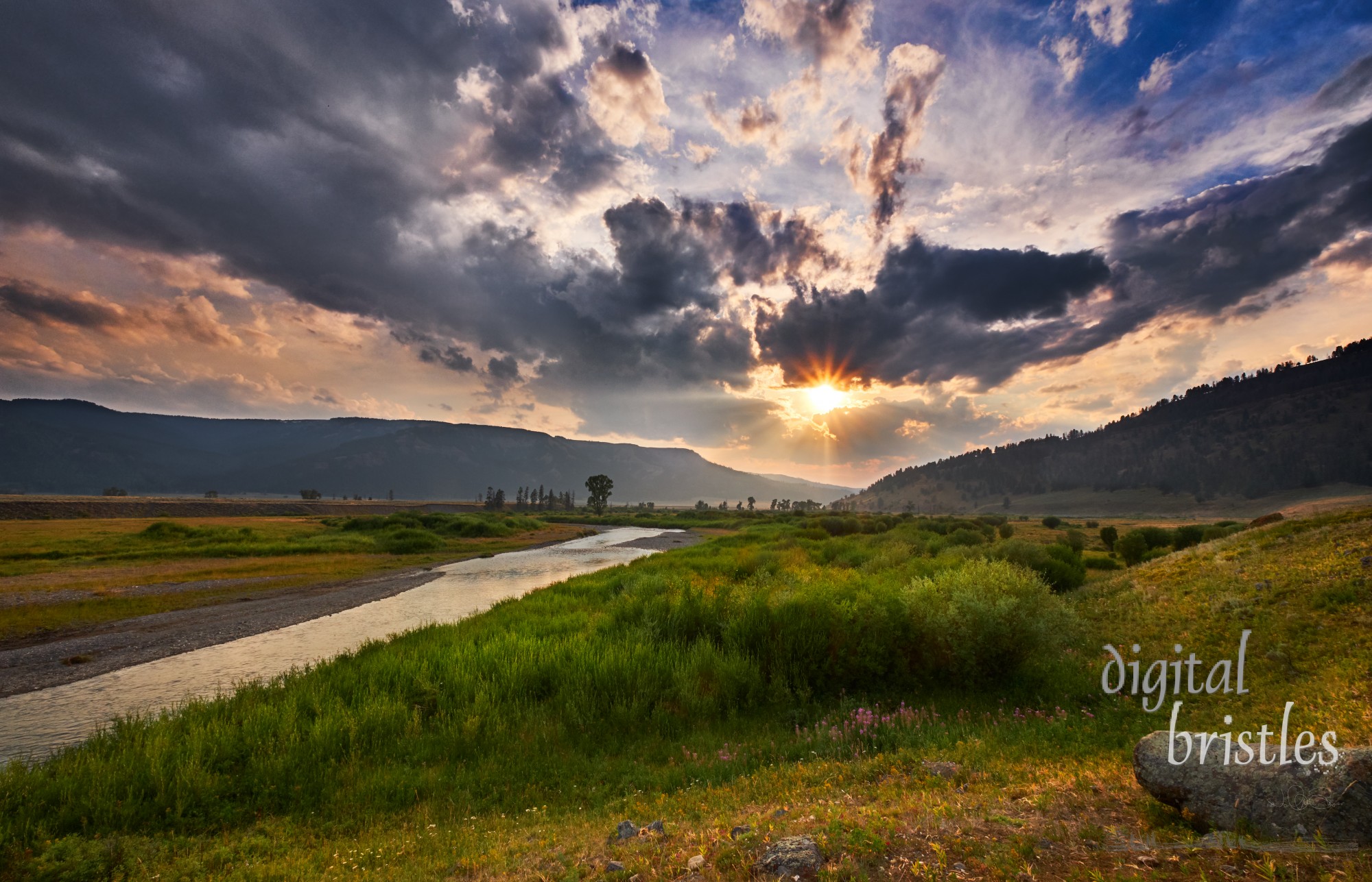 Dramatic clouds as the sun goes down over the Lamar Valley, Yellowstone National Park, Wyoming