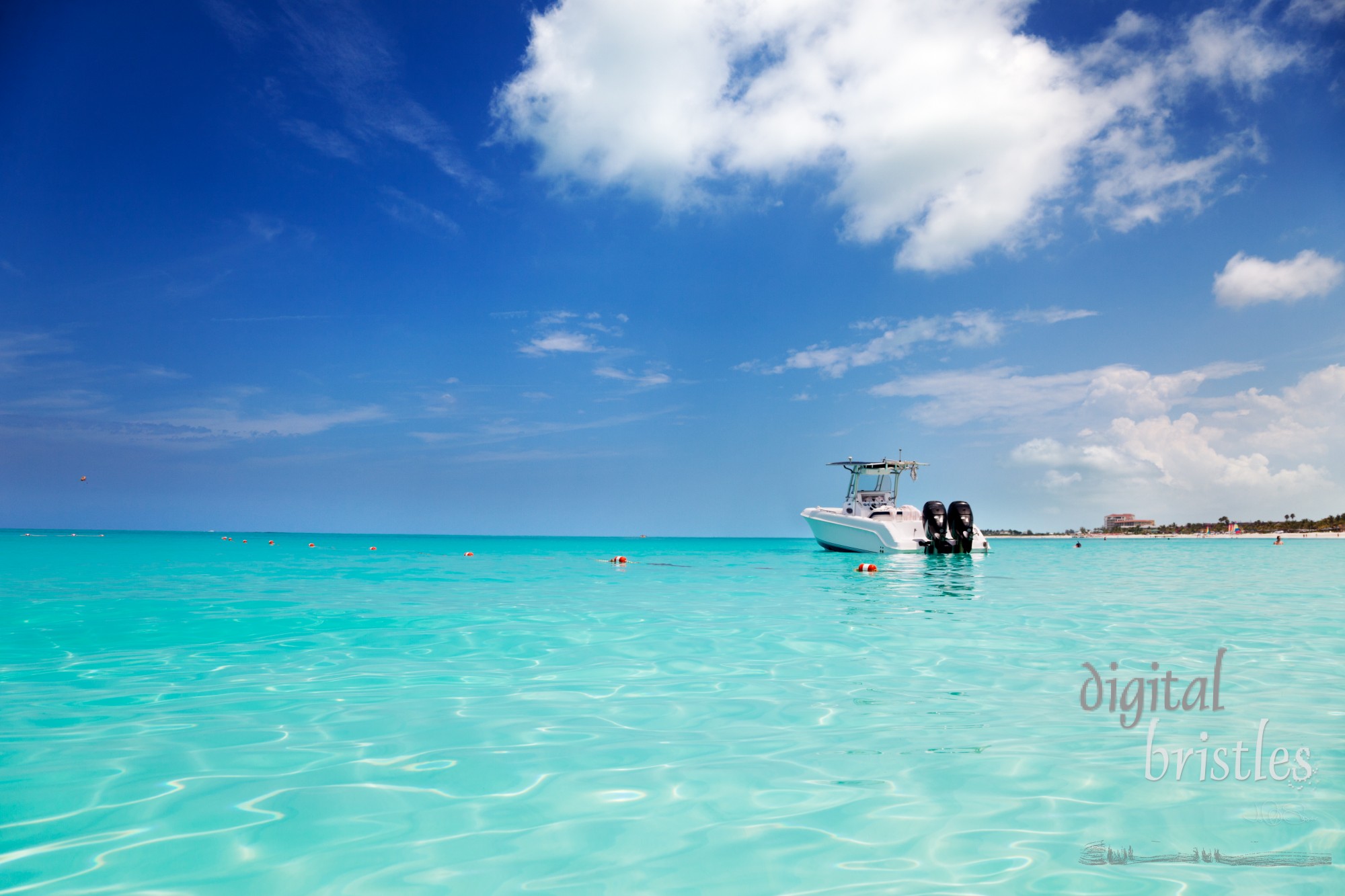 Speedboat anchored in the calm shallows of Grace Bay, Turks & Caicos