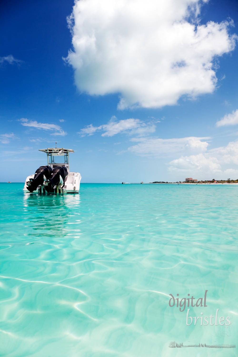 Speedboat anchored in the calm shallows of Grace Bay, Turks & Caicos