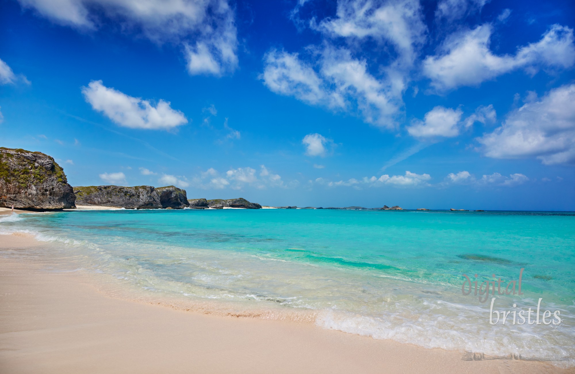 Cliffs, reef and turquoise shallows at Mudjin Harbor, Middle Caicos