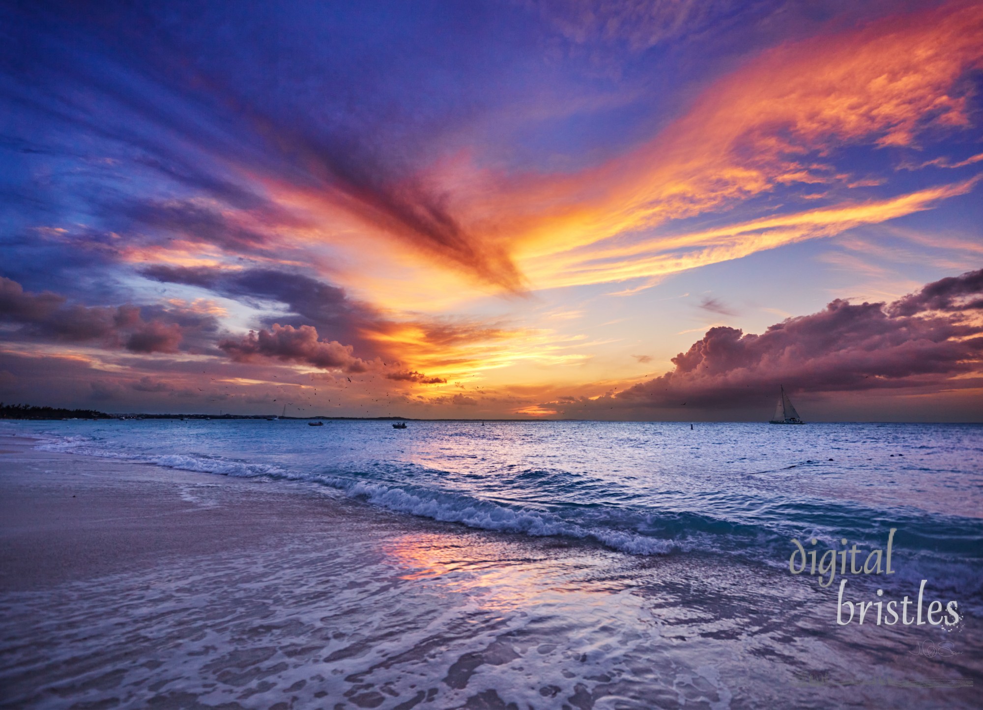 Clouds lit up by sunset.  Grace Bay Beach (at Park on Princess Drive), Providenciales, Turks and Caicos Islands